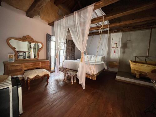 Giường trong phòng chung tại Pringamosa hotel boutique