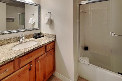 a bathroom with a sink and a shower and a mirror at Timberline Condominiums 3 Bedroom Standard Unit D2A in Snowmass Village