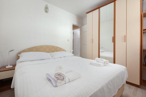 Ένα ή περισσότερα κρεβάτια σε δωμάτιο στο Nykolas