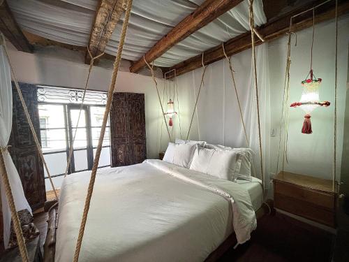 Giường trong phòng chung tại Pringamosa hotel boutique