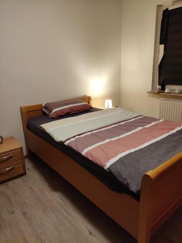 Кровать или кровати в номере Doppelbett