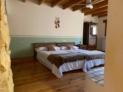 Postel nebo postele na pokoji v ubytování MASIA MAS DE LA CREU