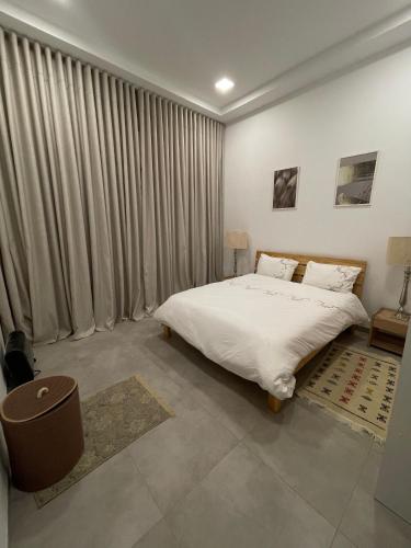 Ένα ή περισσότερα κρεβάτια σε δωμάτιο στο La perle de la marsa