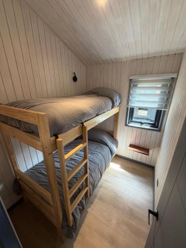 Katil atau katil-katil dalam bilik di Cabañas Cucao