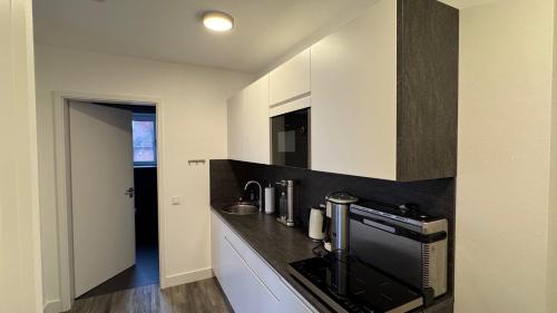 Køkken eller tekøkken på Ferienwohnung Pamir in Olpenitzdorf