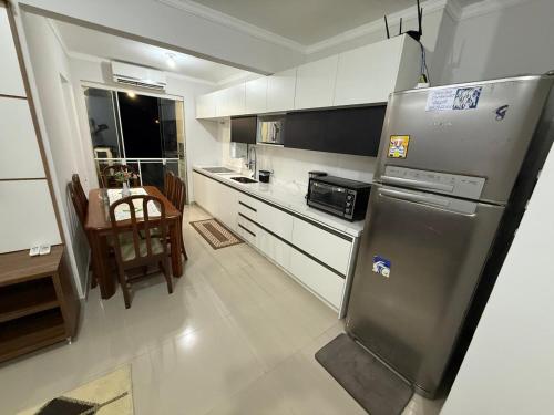 Køkken eller tekøkken på Apartamento Pantano do Sul