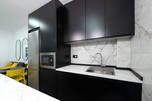 Apart a 7 min de Puerta del Sol con AC y 4 pax