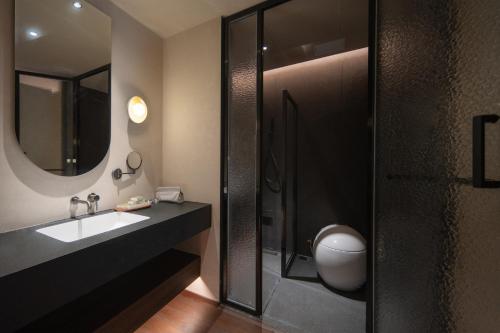 Koupelna v ubytování Chaozhou About Meisu Ancient City Store