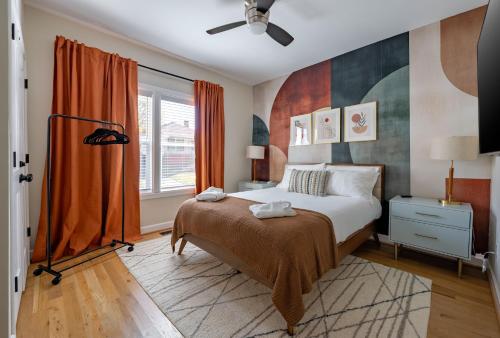 a bedroom with a bed and a window at Casa Verde in Durham