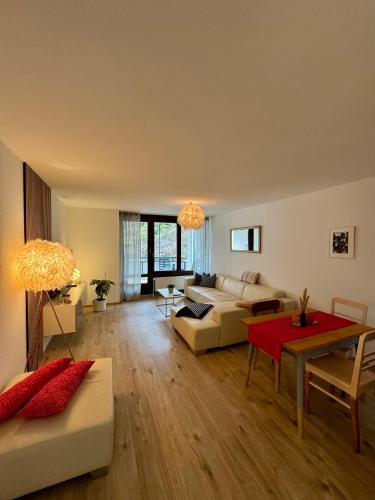 a living room with a couch and a table at Ferienwohnung No 5`2 Rottweil in Rottweil