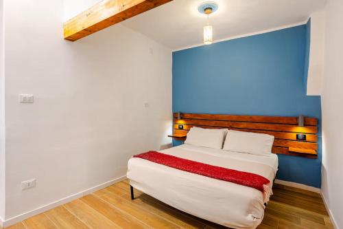 En eller flere senge i et værelse på Casa Vacanza Dante 17 Carini