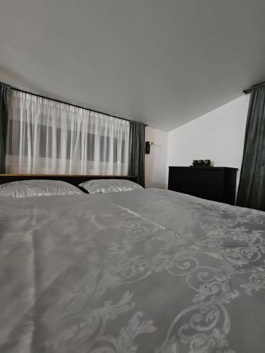 Giường trong phòng chung tại AMRAI Magnetic