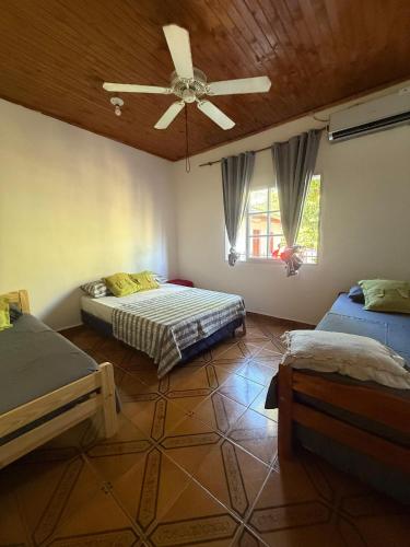 En eller flere senge i et værelse på Cabañas Vacaciones Copadas VC