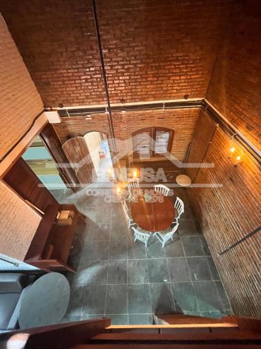 an overhead view of a room with a table at Chácara passárgada in Gravatá