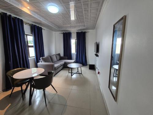 Posezení v ubytování Mandy & Mos' Greenfields Cottage