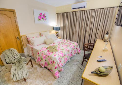 Postel nebo postele na pokoji v ubytování Hotel Golden Park Uberaba By Nacional Inn