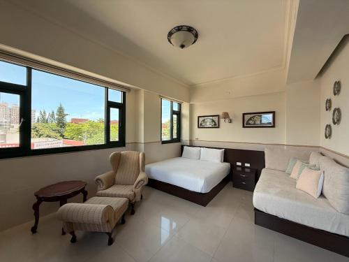 Ένα ή περισσότερα κρεβάτια σε δωμάτιο στο Ho Feng Private Hotel 電梯自助民宿