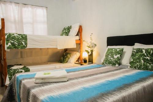 Postel nebo postele na pokoji v ubytování Posada CON PISCINA Y DESAYUNO