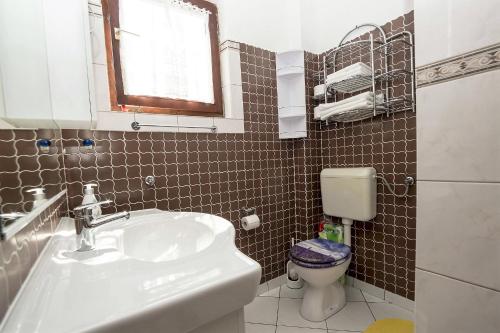 Phòng tắm tại Apartmani Nata