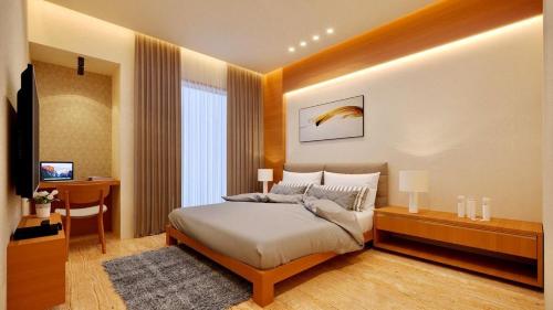 En eller flere senge i et værelse på The Royal Retreat