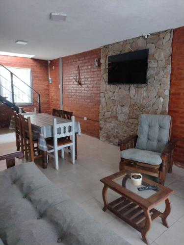 Et tv og/eller underholdning på Casa Familiar cerca del Río