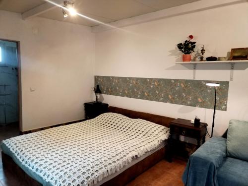 Un ou plusieurs lits dans un hébergement de l'établissement Casa 99 in Barbéns, Miranda do Corvo