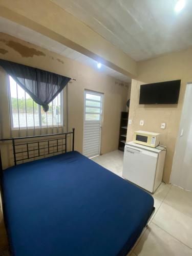 En eller flere senge i et værelse på Pousada Patriarca Silva