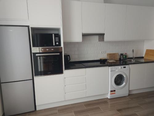 Nhà bếp/bếp nhỏ tại Casa do largo