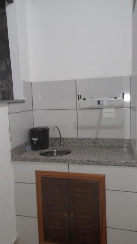 Η κουζίνα ή μικρή κουζίνα στο SUITE ACONCHEGANTE 02