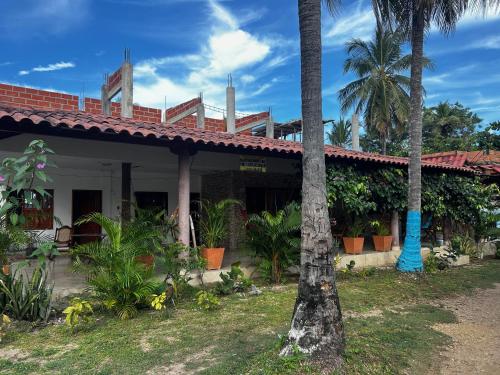 Zahrada ubytování Hospedaje PALMERAS PUNTA TRITON