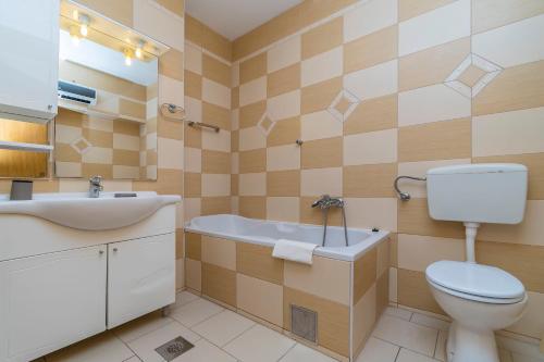 Et badeværelse på Apartments Biljana
