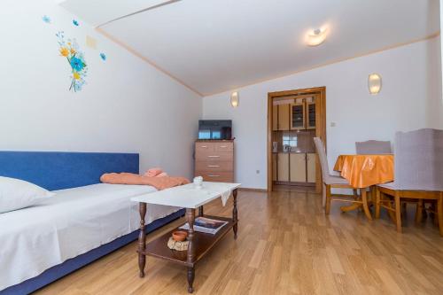 En eller flere senge i et værelse på Apartments Biljana