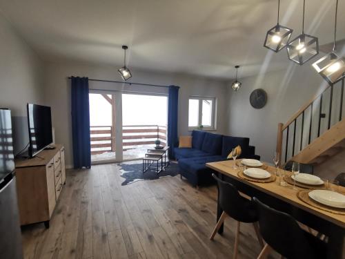 TV a/nebo společenská místnost v ubytování Apartamenty Ewa