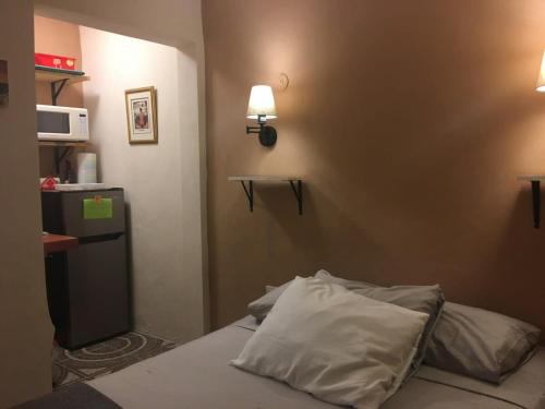 Postel nebo postele na pokoji v ubytování Mini Vacation in Chelem