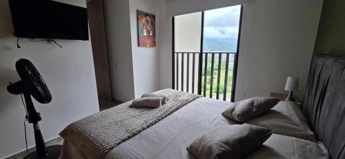 Llit o llits en una habitació de VistaVive!