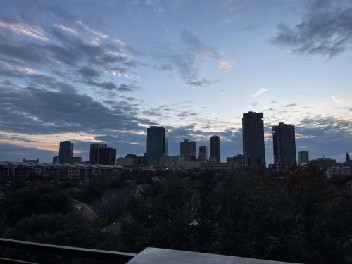 a view of a city skyline with tall buildings at The Nichols Estate - Fort Worth - SameDay Bookings in Fort Worth