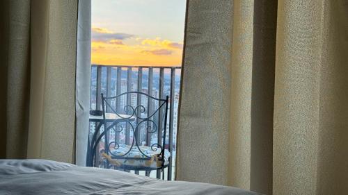 En eller flere senge i et værelse på Marble Horizon Skyline