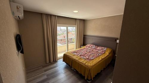 En eller flere senge i et værelse på Casa del parque 316