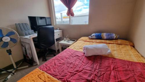 En eller flere senge i et værelse på La Estancia 399