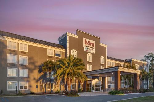a rendering of the hotel front of the hotel at HOM Hotel Gainesville, SureStay Collection by Best Western in Gainesville