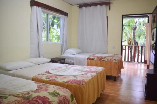 Postel nebo postele na pokoji v ubytování Viñas Hotel