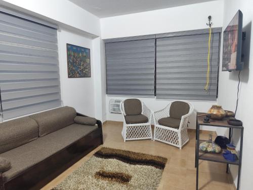 Posezení v ubytování Apartment on Margarita Island edif Lagunablanca Apto 1201