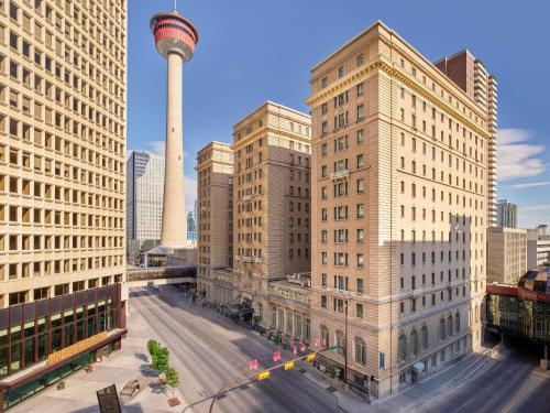 a view of a city with buildings and a tower at Fairmont Palliser in Calgary