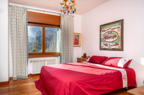 En eller flere senge i et værelse på Ciasa Marian 10 minutes from Cortina with free parking!