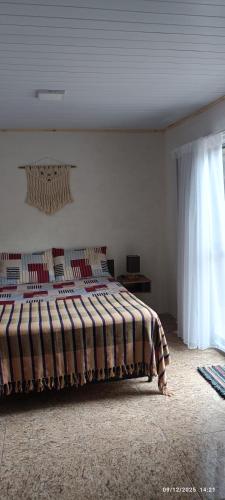 Llit o llits en una habitació de Micasa