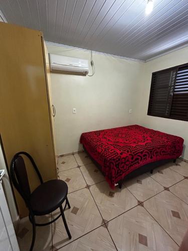 En eller flere senge i et værelse på Casa ampla 4 quartos Piratuba