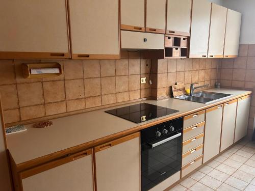 Kuchyň nebo kuchyňský kout v ubytování Casa Iris