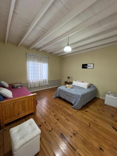 Ένα ή περισσότερα κρεβάτια σε δωμάτιο στο Hospedaje - Rincon de Paso - RC