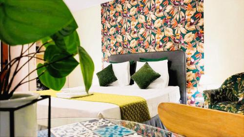 Postel nebo postele na pokoji v ubytování Le Ti Marinois 6