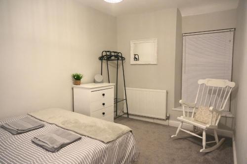 En eller flere senge i et værelse på 4 Cross Ifor Terrace